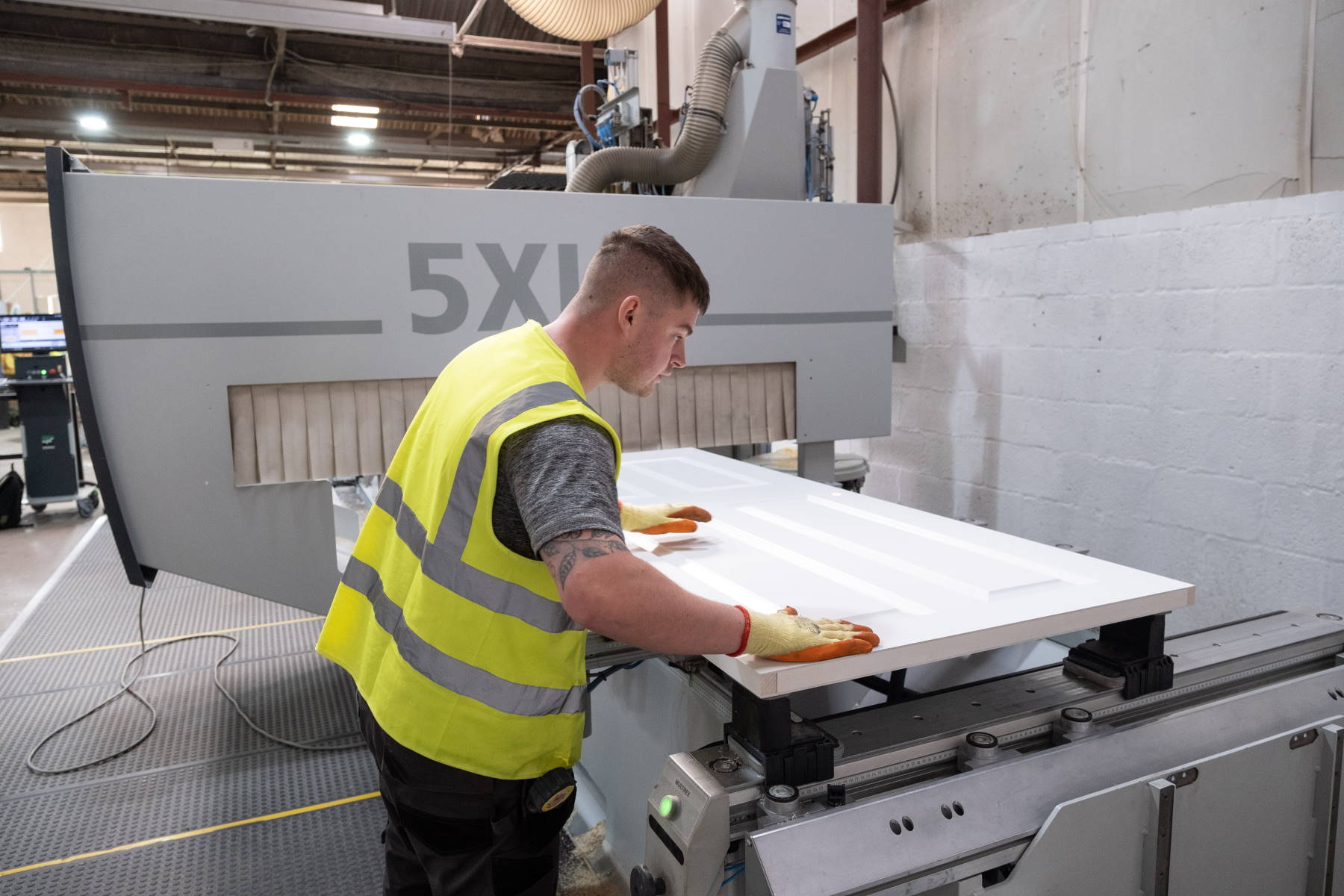 Donaldson Doors employee working on fabricating a new door.